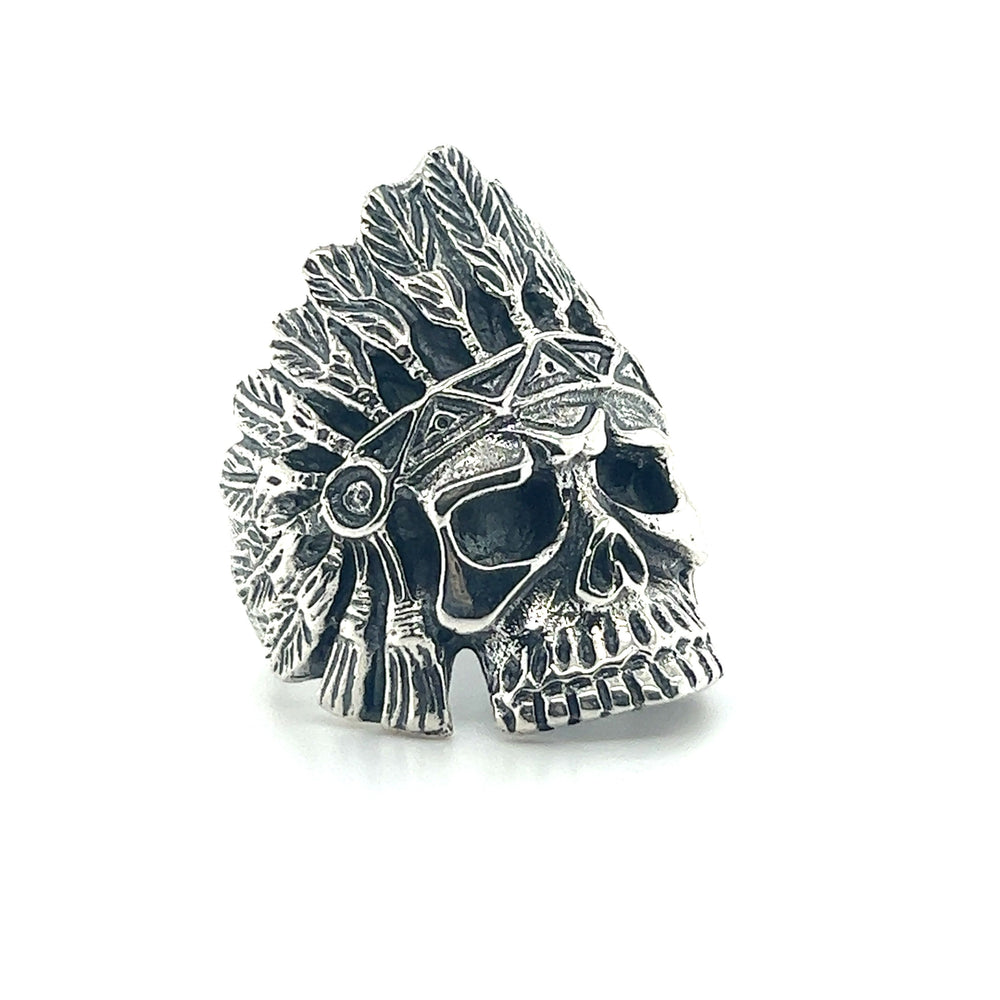 
                  
                    A men's Chief Skull Ring featuring intricate stone inlay and adorned with an Indian headdress.
                  
                