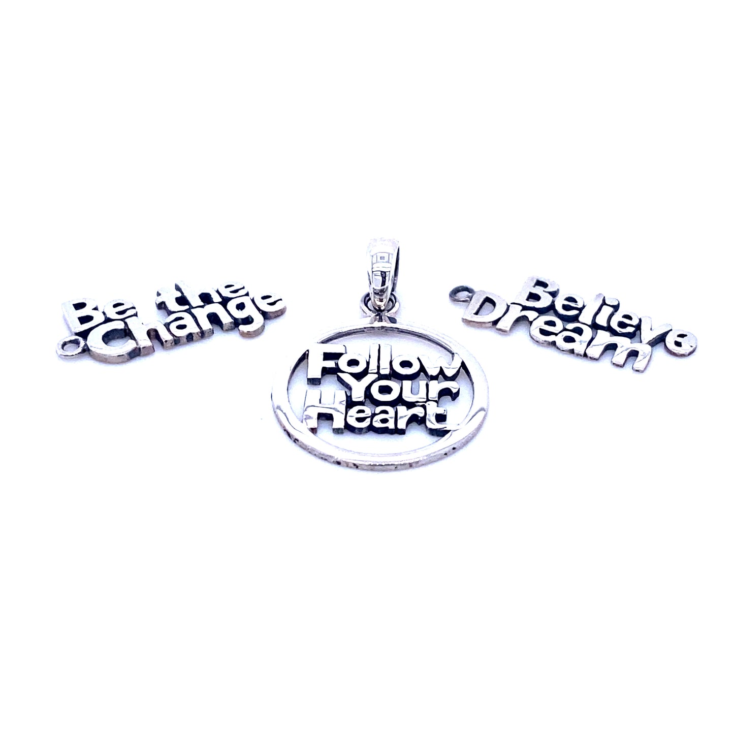 
                  
                    Three Super Silver Affirmation Charms with the affirmation 'follow your dream'.
                  
                
