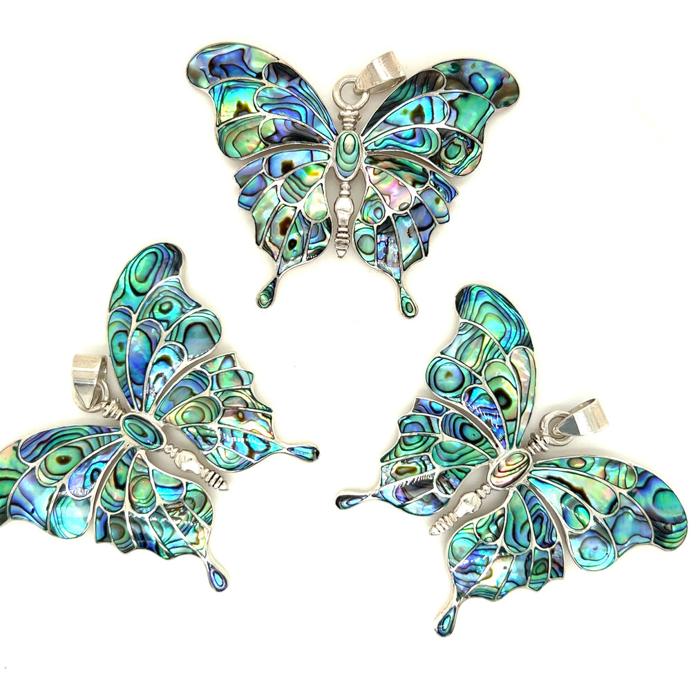 
                  
                    Three Stunning Inlay Butterfly Pendants on a white background, from Super Silver.
                  
                