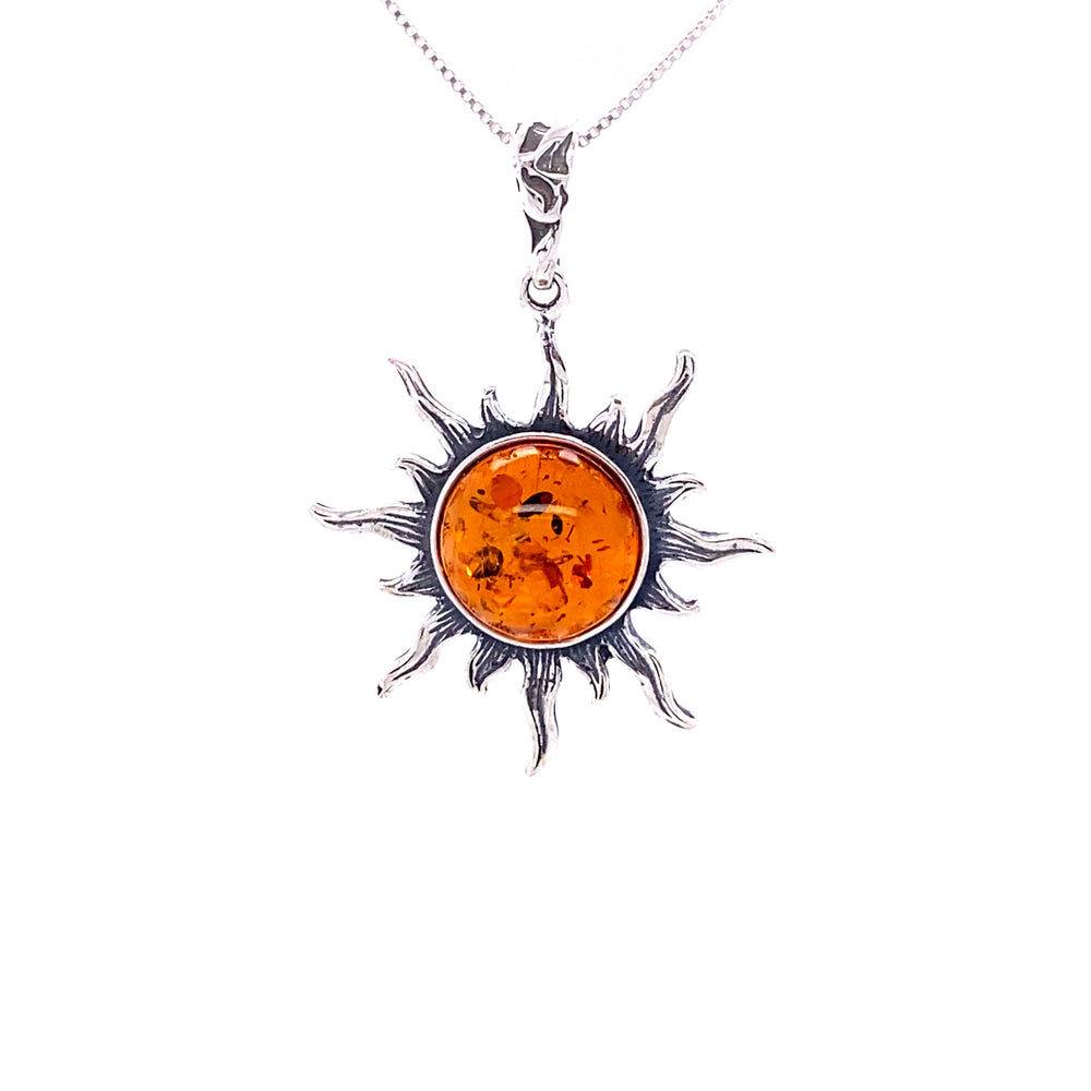 A necklace with a Radiant Amber Sun Pendant on a Super Silver chain.