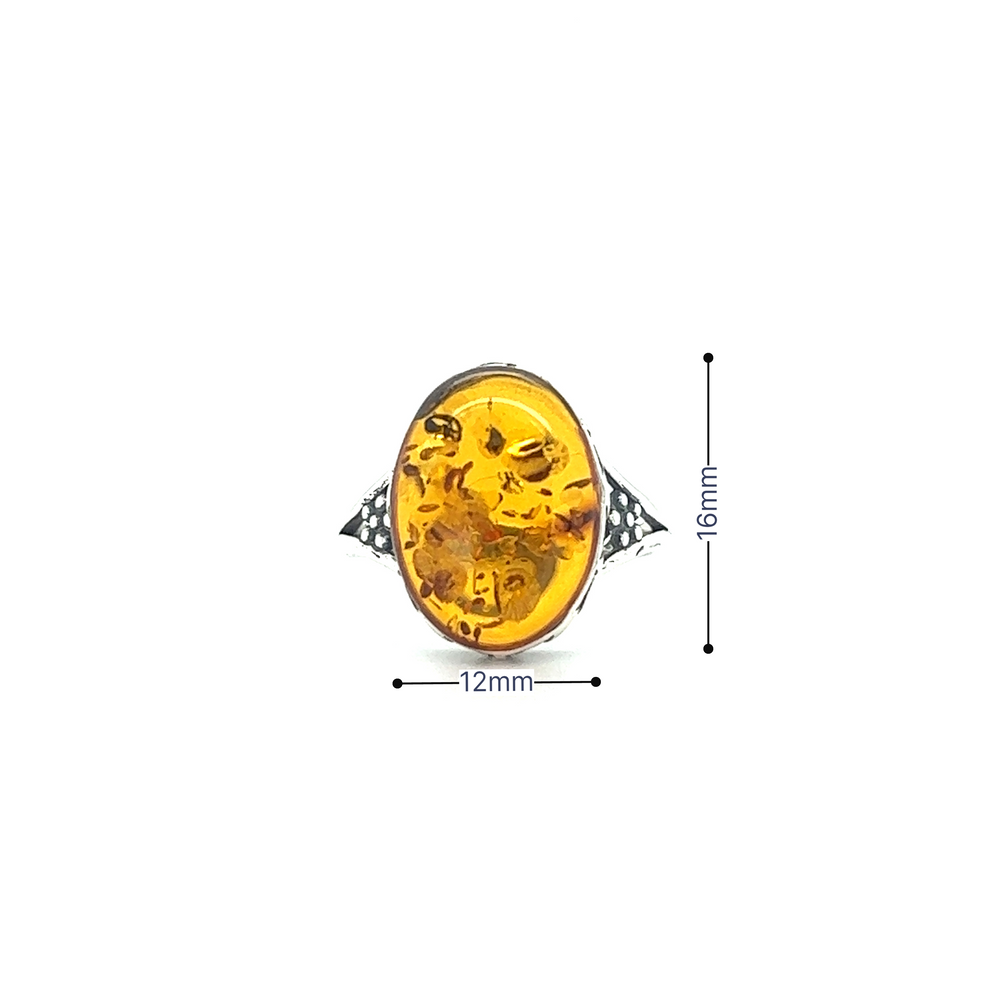 A Super Silver boho chic oval Baltic Amber ring with Victorian styled floral setting, perfect for everyday style.