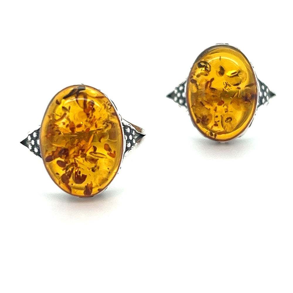 A pair of Super Silver baltic amber stud earrings, perfect for everyday style.