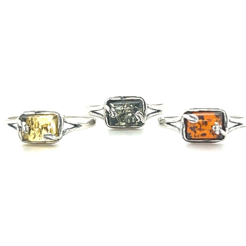 Three Super Silver Rectangle Amber Rings with amber and Baltic Amber stones.