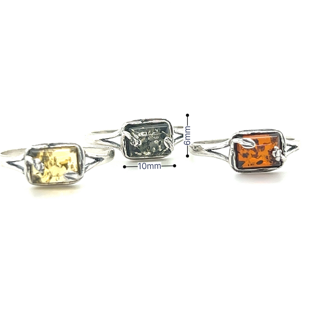 A set of three Rectangle Amber Rings with Nature Detailing, made by Super Silver.