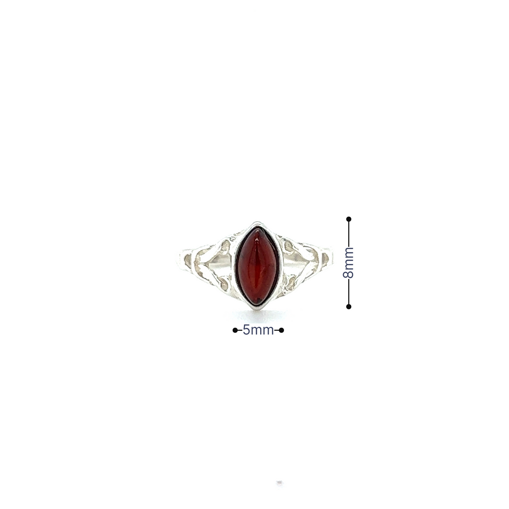 
                  
                    A Delicate Celtic Inspired Amber Ring from Super Silver, with a red stone, perfect for healing and spiritual growth.
                  
                