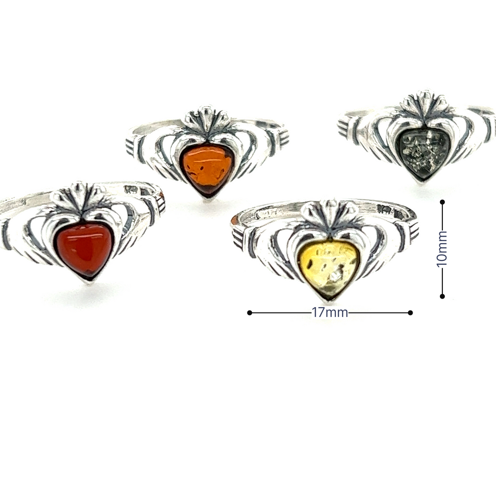 
                  
                    Super Silver's Claddagh Amber Heart Ring with amethyst.
                  
                