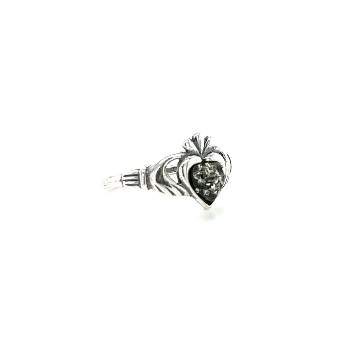 
                  
                    A Claddagh Amber Heart Ring by Super Silver, made of .925 Sterling Silver with a black stone, representing love and friendship.
                  
                