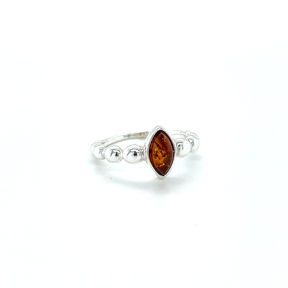 
                  
                    A Super Silver Modern Amber Ring with Half Beaded Band.
                  
                
