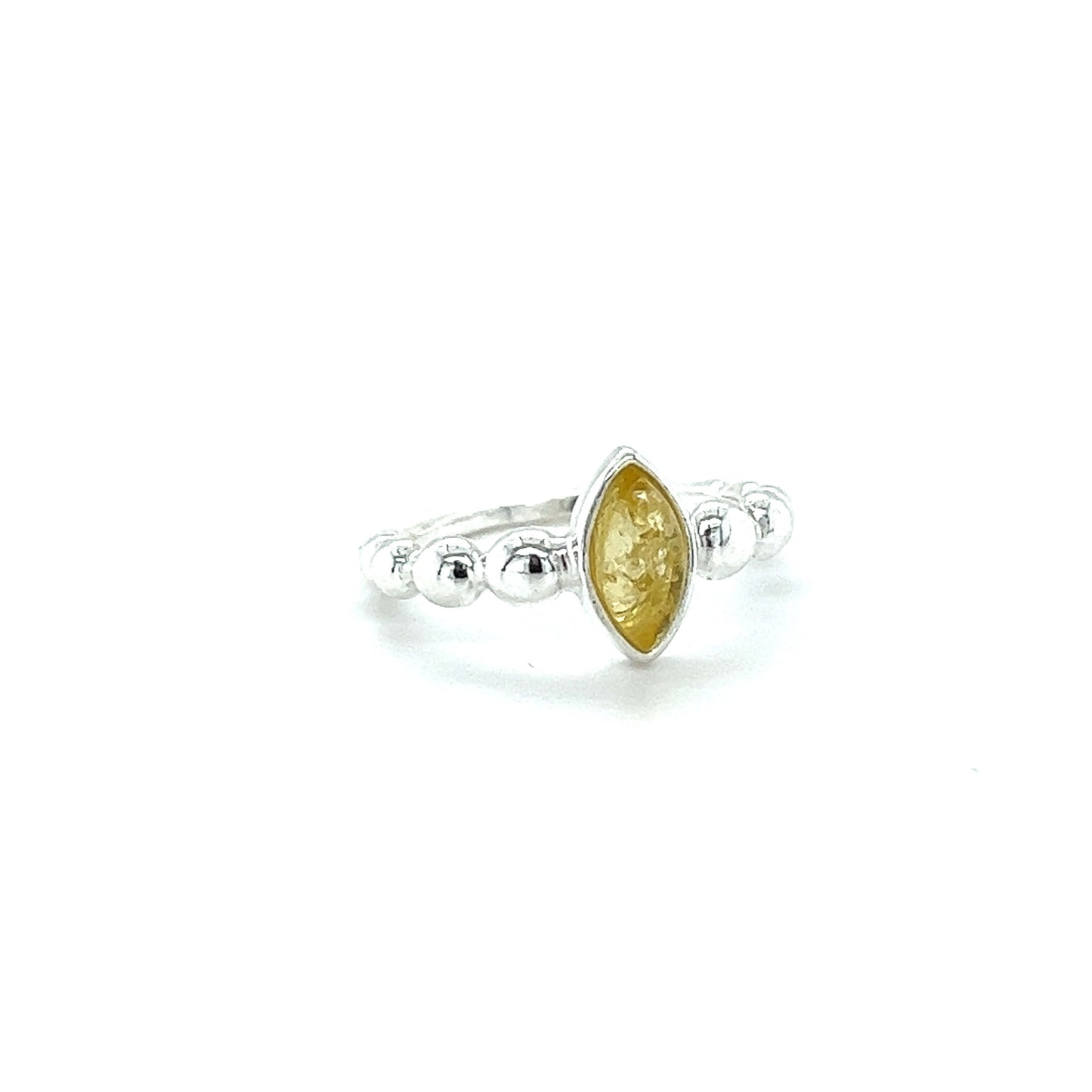 
                  
                    A Modern Amber Ring with Half Beaded Band by Super Silver, in .925 Sterling Silver.
                  
                