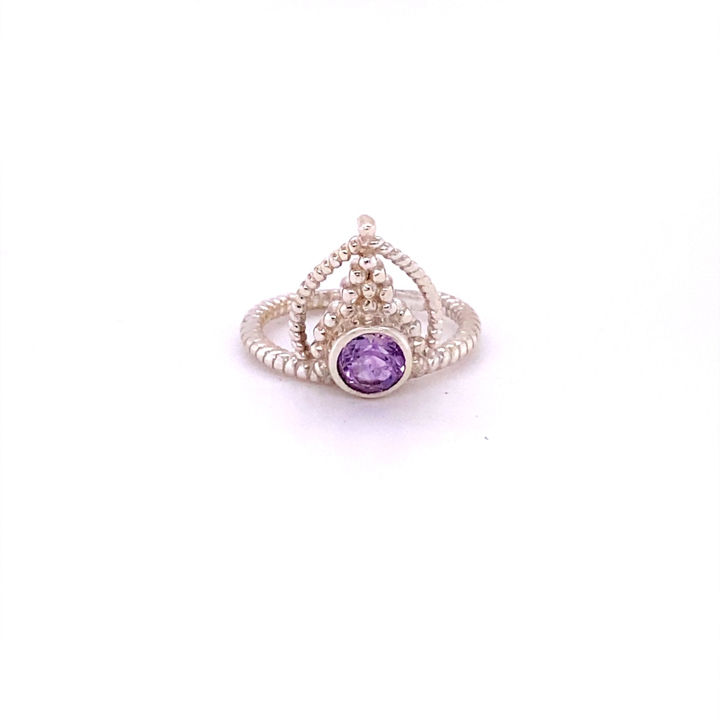 A Simple Tiara Ring with Natural Gemstones with a cabochon purple stone.