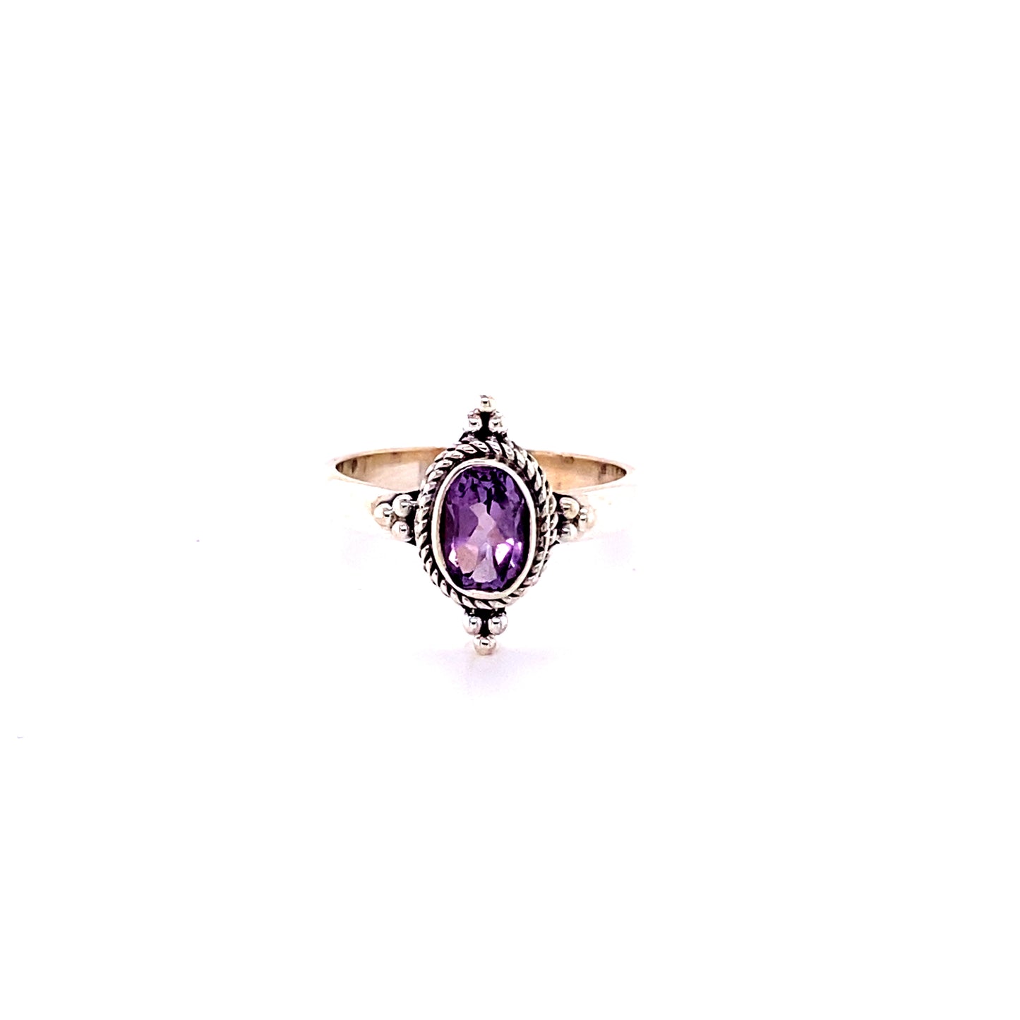 
                  
                    Four Points Gemstone Ring with diamond accents.
                  
                