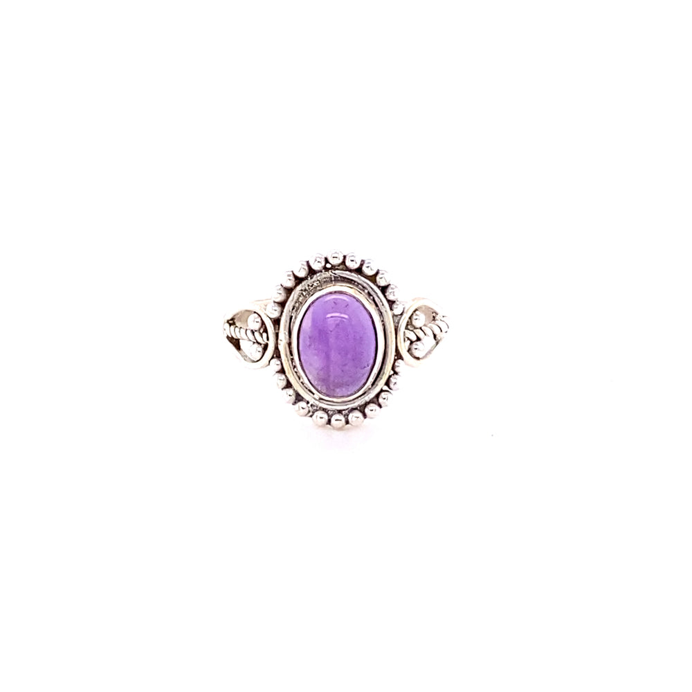 
                  
                    A sterling silver Oval Gemstone with Ball Design ring, set on a white background.
                  
                