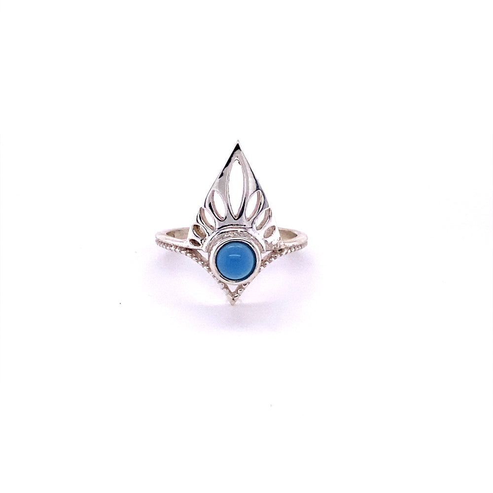 
                  
                    A Henna Shield Ring with Natural Gemstones with a blue stone.
                  
                