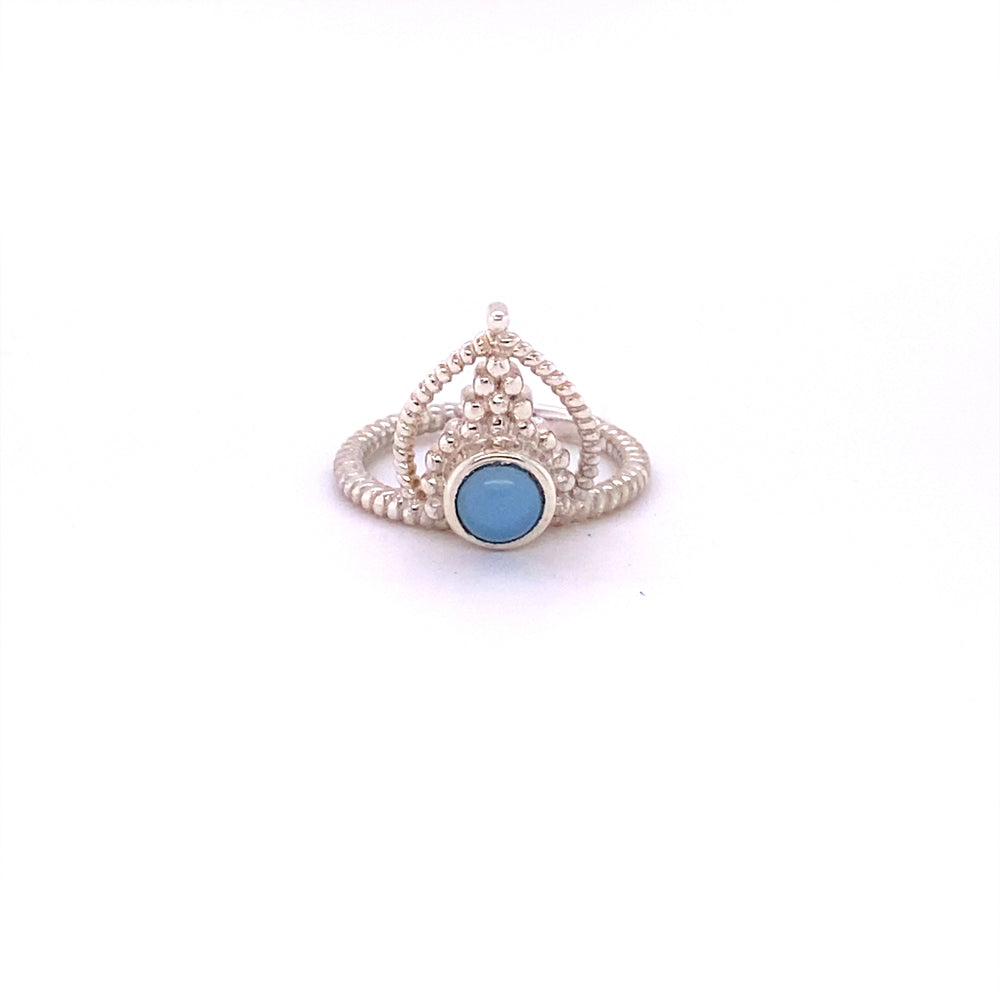 
                  
                    A boho-inspired Simple Tiara Ring with Natural Gemstones adorned with a vibrant turquoise stone.
                  
                