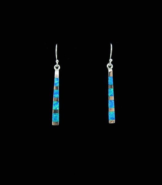A pair of Super Silver Blue Created Opal Rectangle Earrings, crafted from sterling silver, adorned with stunning blue created opal stones and enhanced with a rhodium finish.
