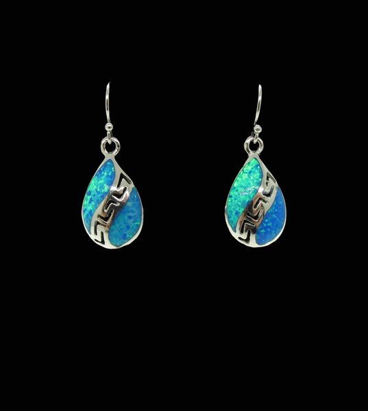 A pair of Super Silver Blue Created Opal Teardrop Shape Earrings with a sterling silver Greek key design.