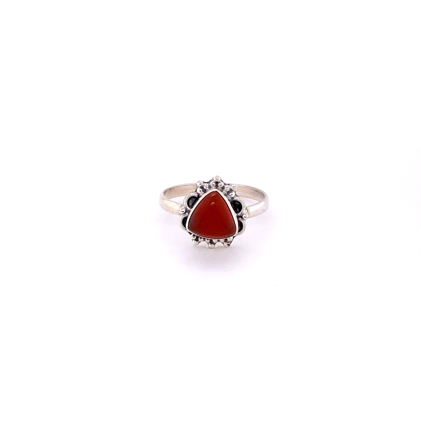 
                  
                    A Triangular Gemstone Ring with Frills made of .925 Sterling Silver, manufactured by Super Silver, featuring a red coral stone.
                  
                