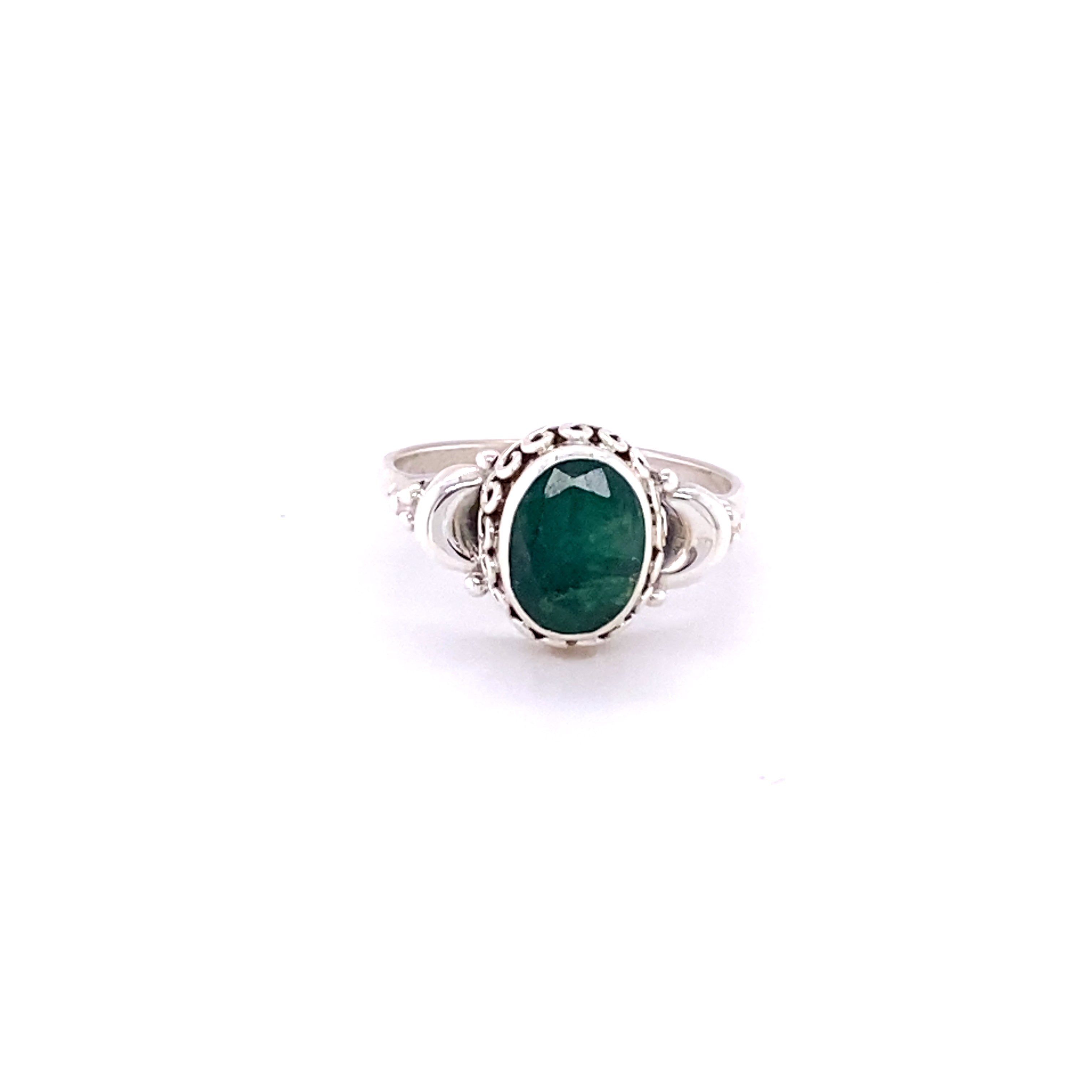 A Beautiful Oval Gemstone Ring with Small Moons on a white background.