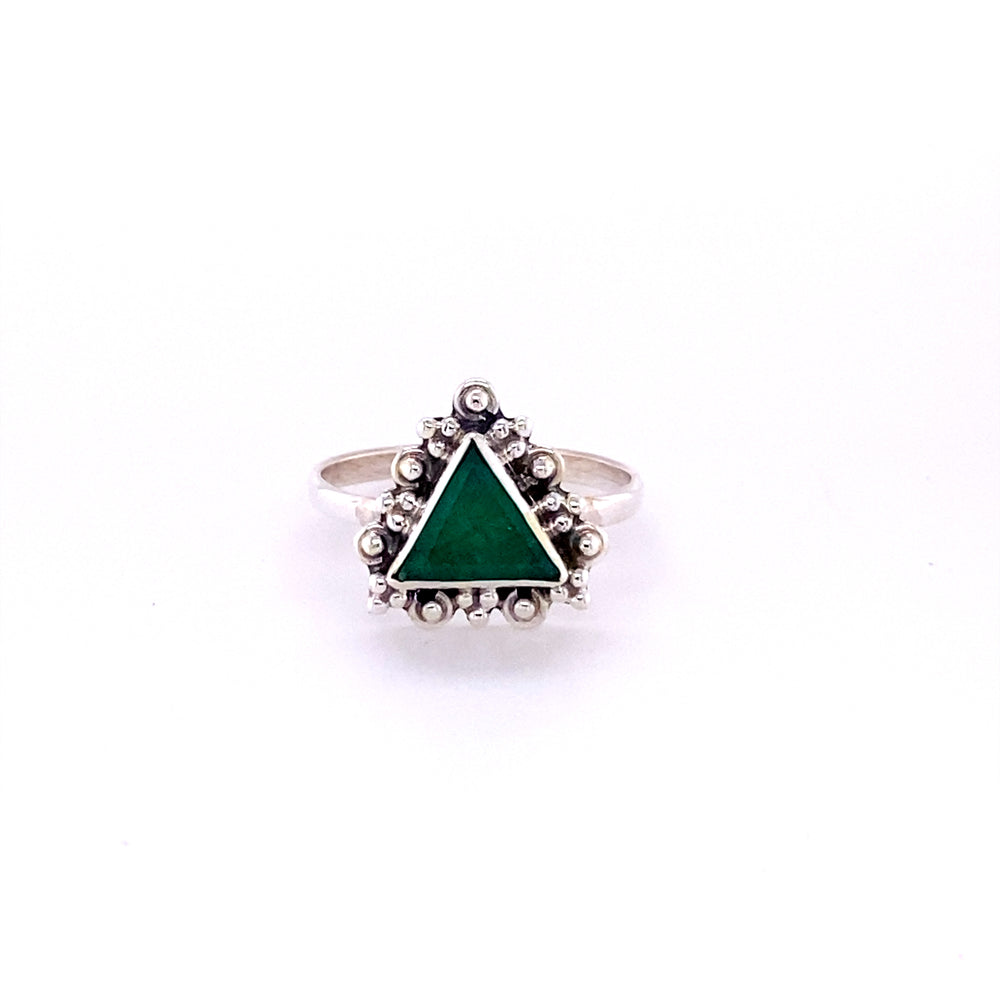 
                  
                    A Delicate Gemstone Triangle Ring from the brand Super Silver, with an emerald stone in the middle and silver beads.
                  
                