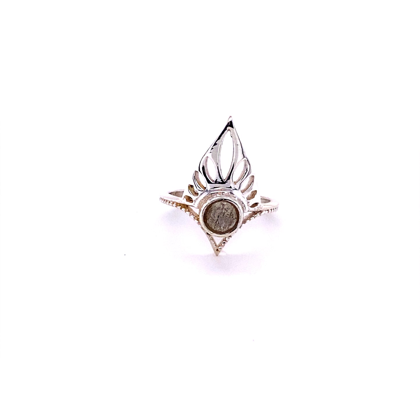 
                  
                    A Henna Shield Ring with Natural Gemstones with a cabochon stone in the middle.
                  
                