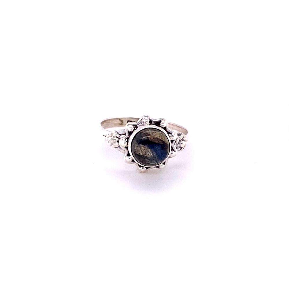 
                  
                    A Flower Ring with Natural Round Gemstone and diamonds.
                  
                