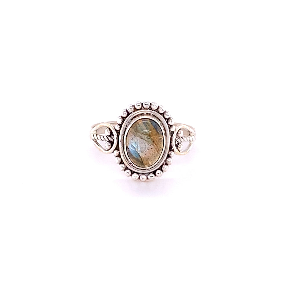 A boho silver ring with an Oval Gemstone with Ball Design.