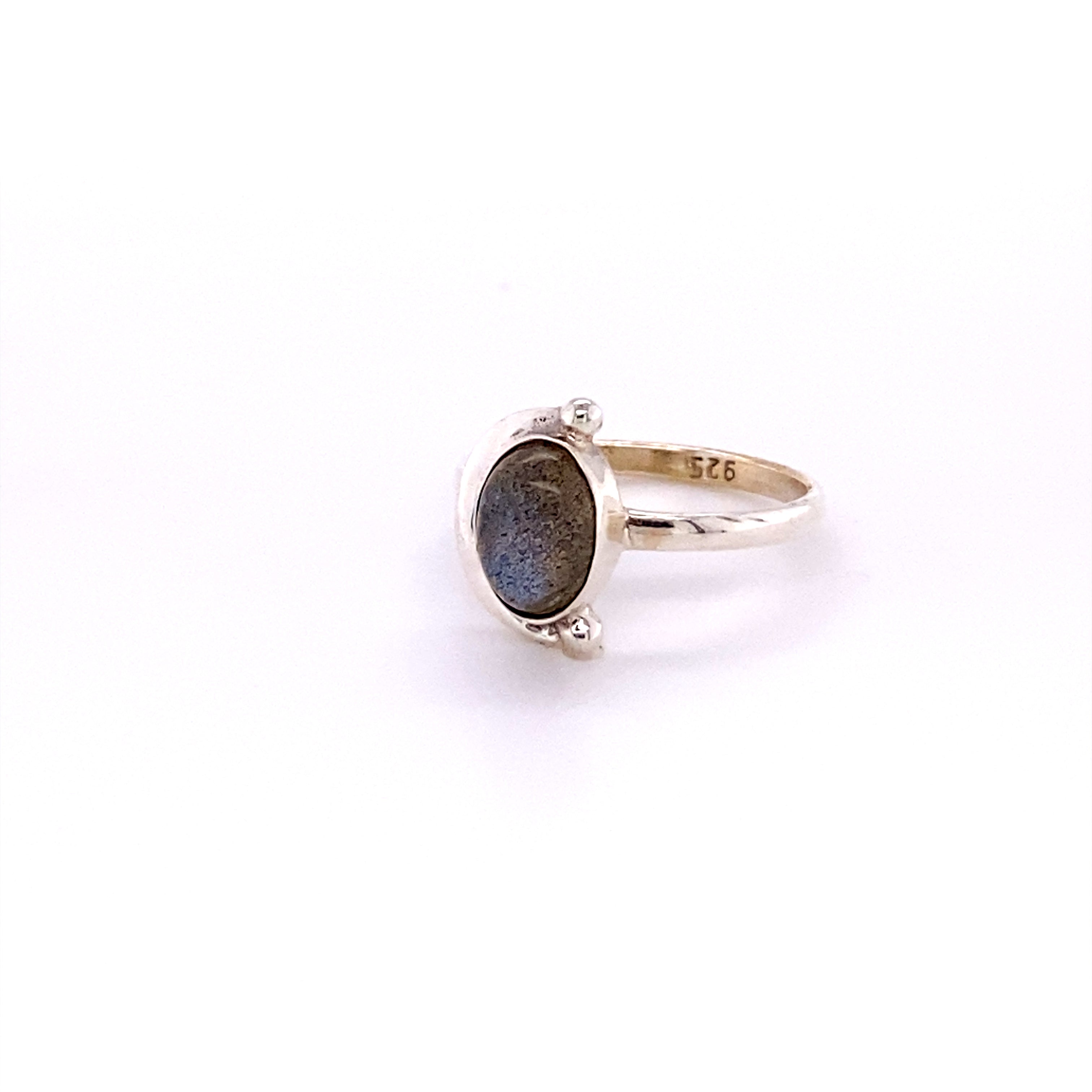 An Oval Crescent Moon Ring with Natural Gemstones on a white background.