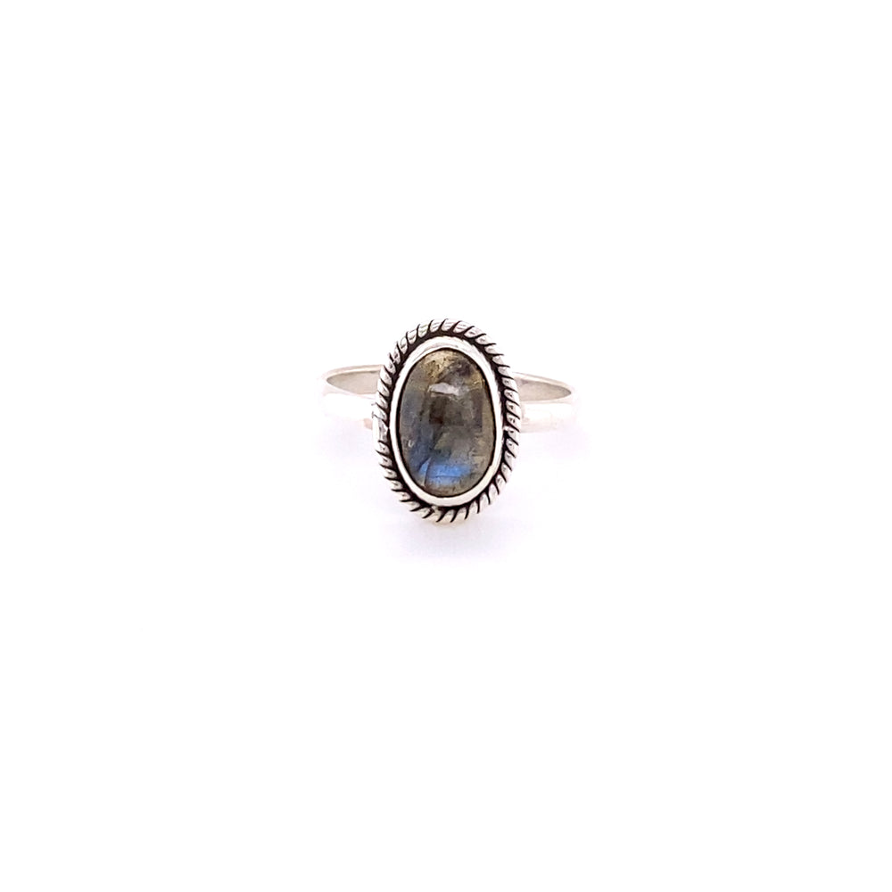 
                  
                    A sterling silver ring featuring a Simple Oval Gemstone Ring with Twisted Rope Border set in a detailed bezel on a white background.
                  
                