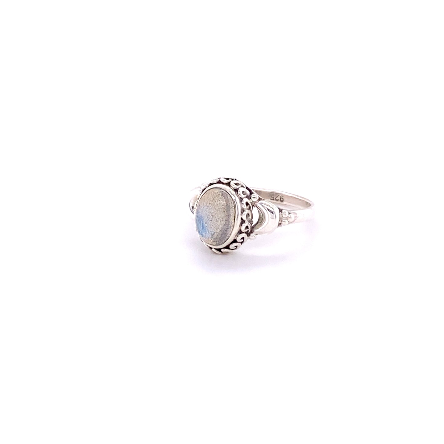 
                  
                    A sterling silver ring with a Beautiful Oval Gemstone Ring with Small Moons cabochon stone.
                  
                