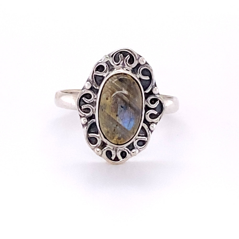 
                  
                    A Oval Gemstone Ring with Swirl Filigree Border, perfect for the hippie at heart or a Santa Cruz loving individual.
                  
                