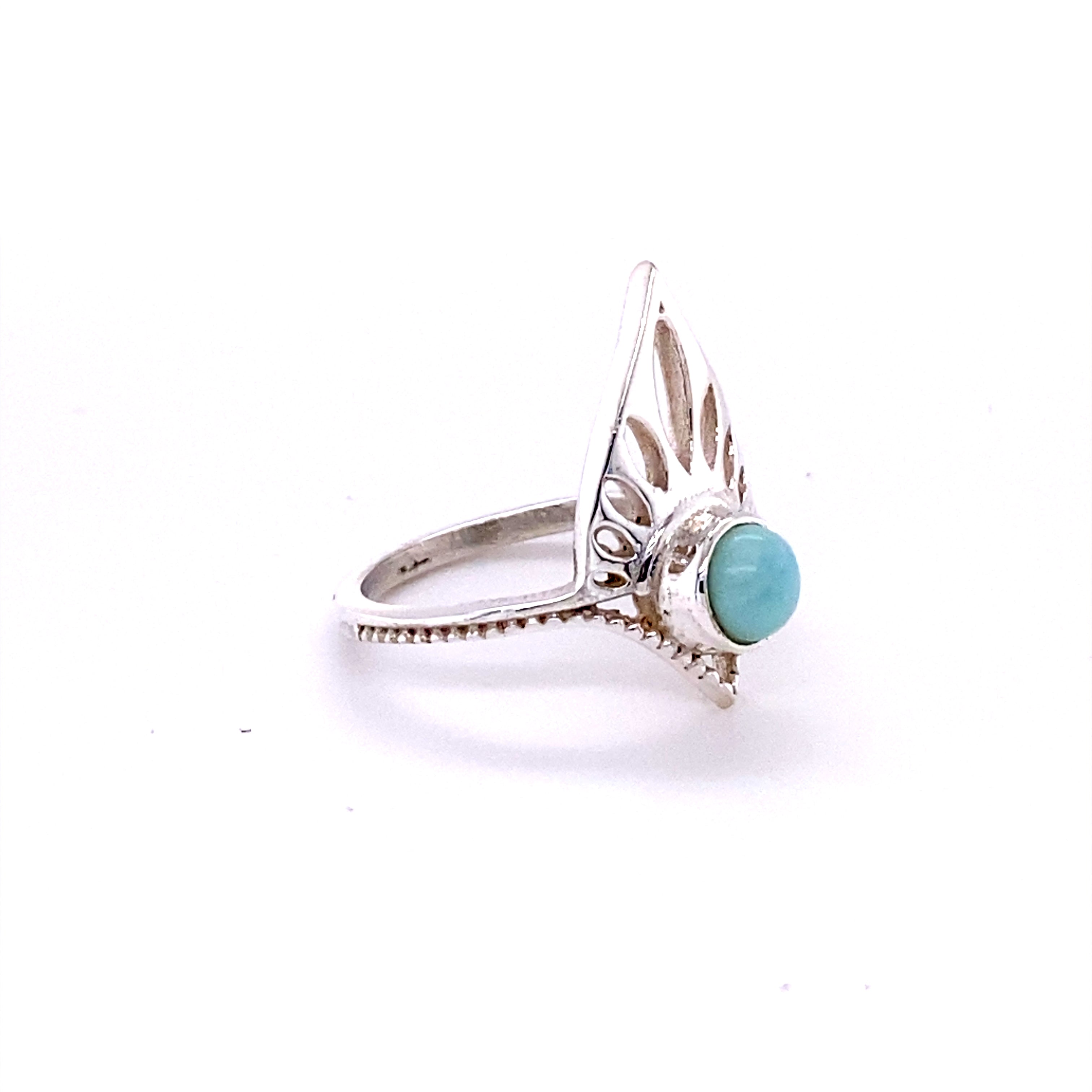 A unique Henna Shield Ring with Natural Gemstones adorned with a vibrant turquoise gemstone by Super Silver.