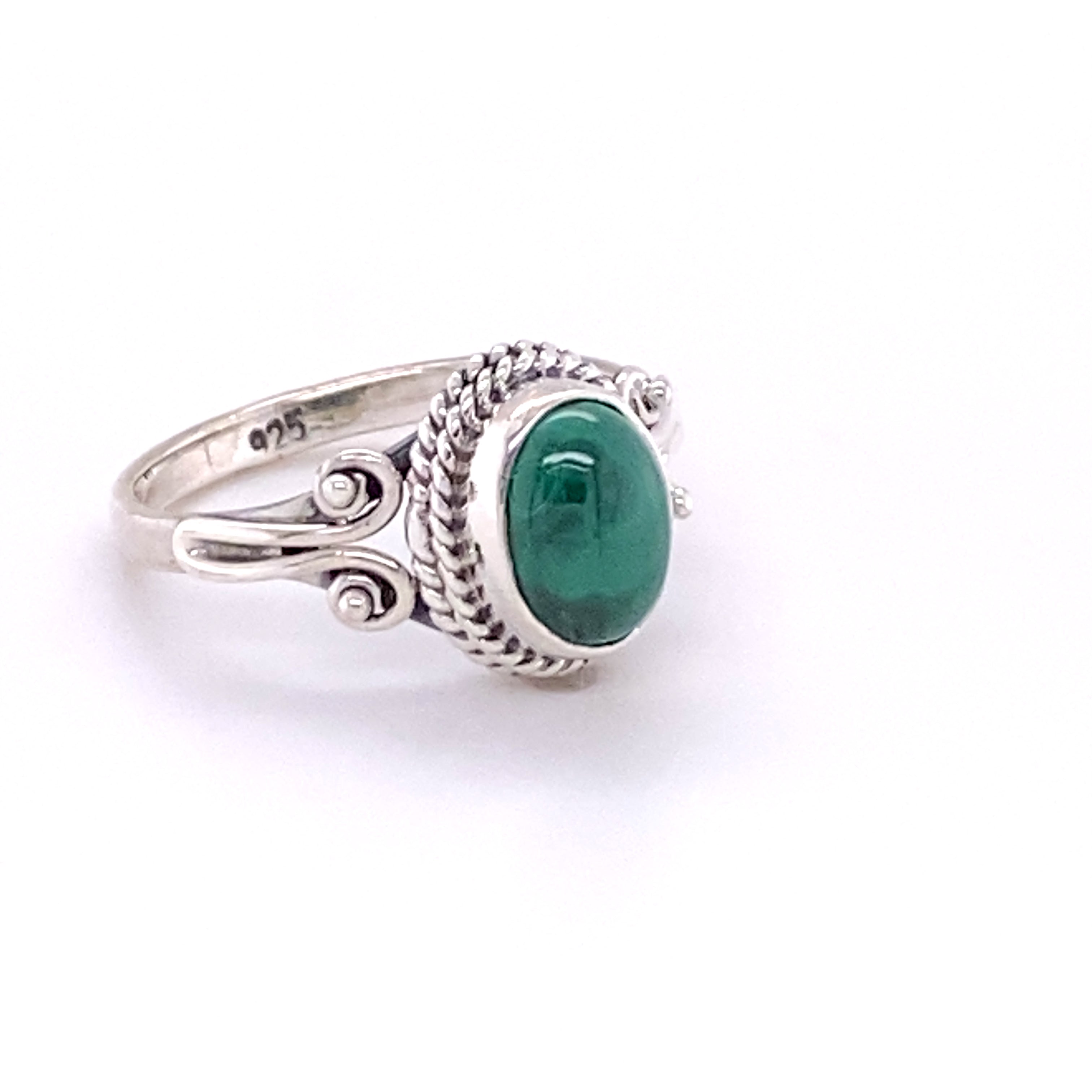 A Oval Natural Gemstone Ring with Rope and Long Spiral Border with a cabochon emerald stone.