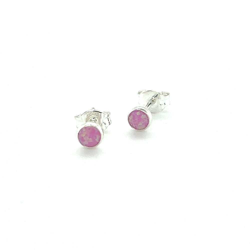 
                  
                    A pair of Super Silver Dainty Opal Studs crafted with sterling silver on a white background.
                  
                