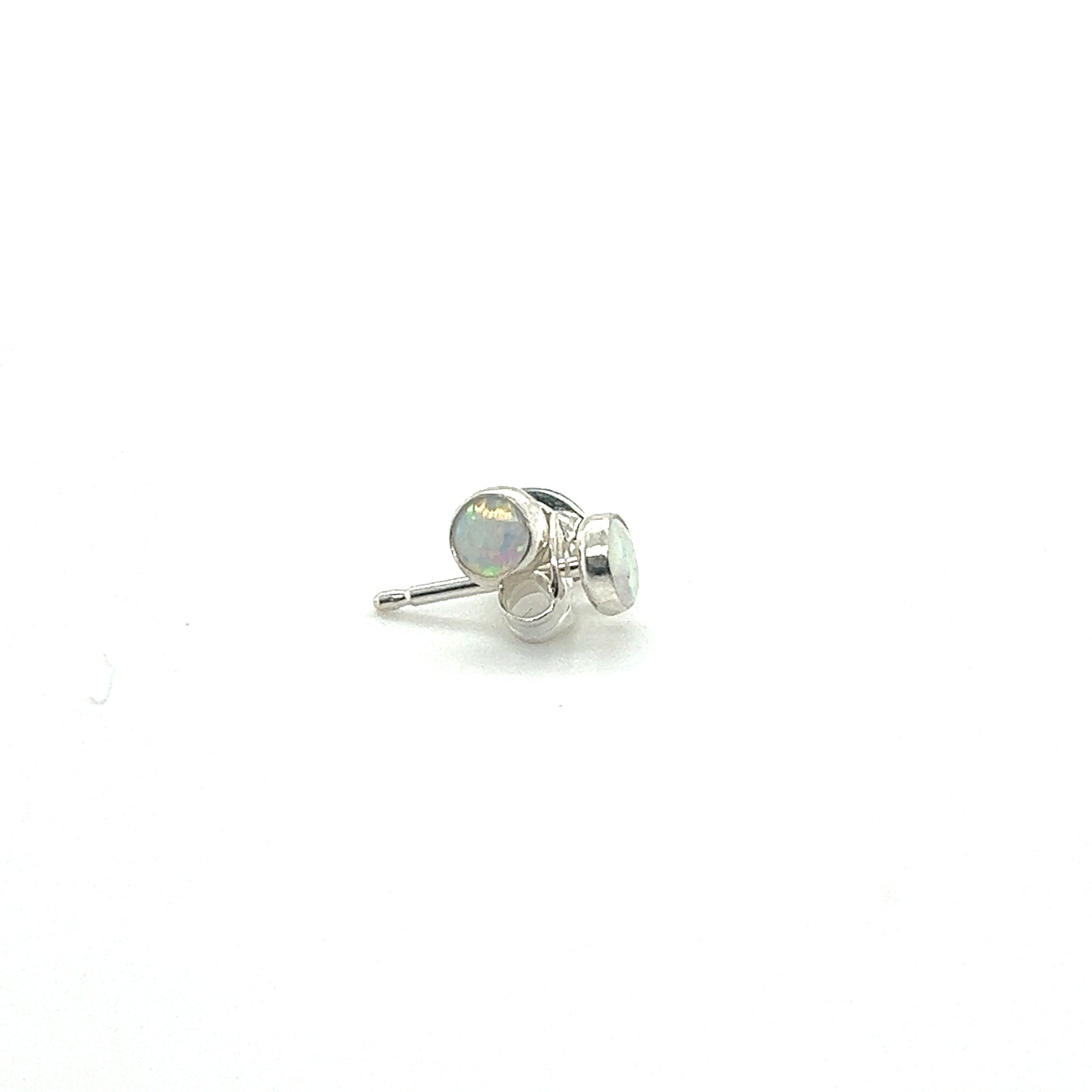 
                  
                    A pair of Super Silver Dainty Opal Studs, made of sterling silver, showcased on a white surface.
                  
                