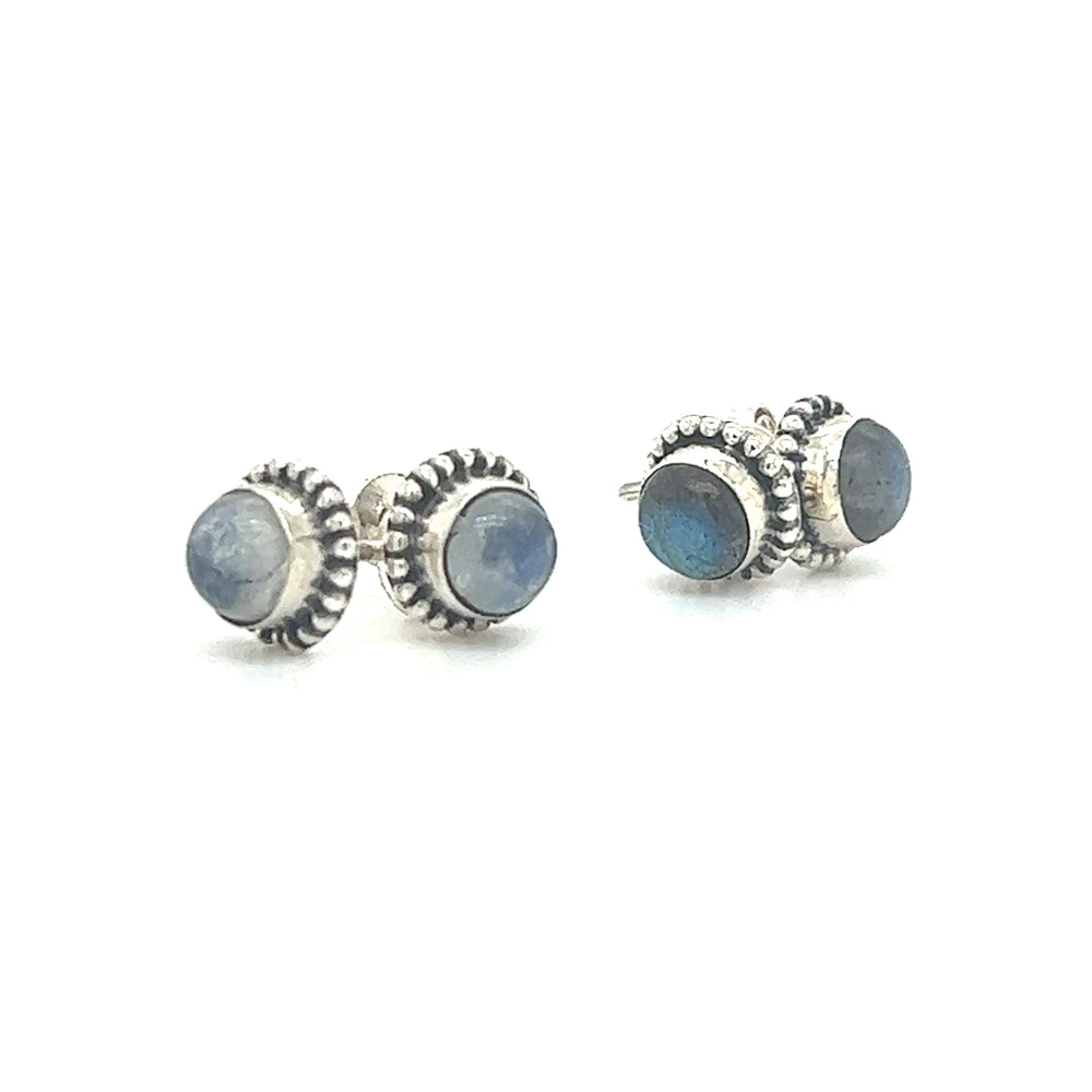 Chic Beaded Round Stone Studs in sterling silver. These luminous stones capture the mesmerizing beauty of Moonstone in a classic pair of Super Silver stud earrings.
