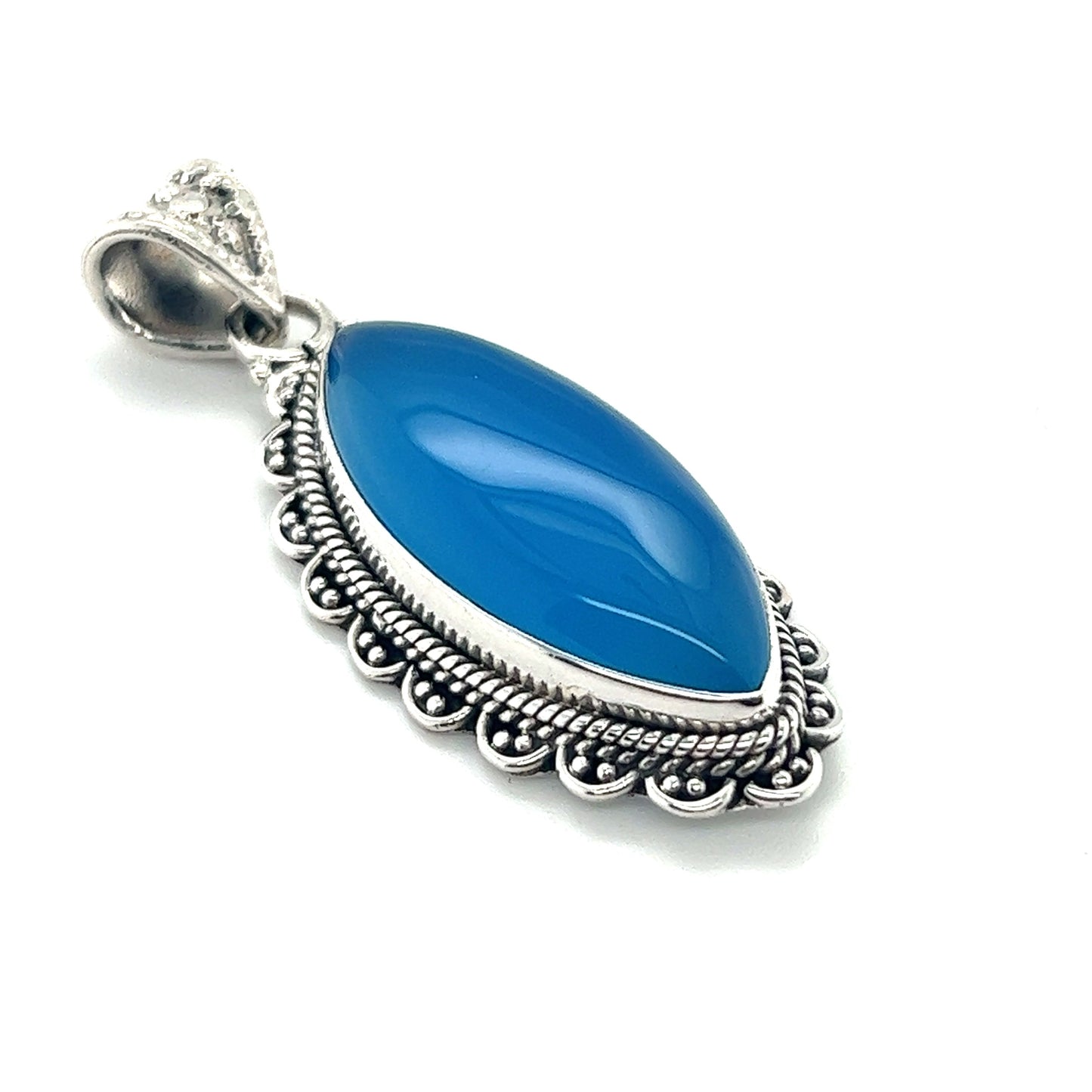
                  
                    A Marquise Shaped Gemstone Pendant by Super Silver featuring a vibrant blue chalcedony stone.
                  
                