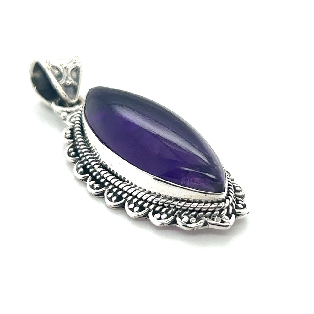 
                  
                    A Marquise Shaped Gemstone Pendant in sterling silver showcases the vibrant color of this captivating Super Silver.
                  
                