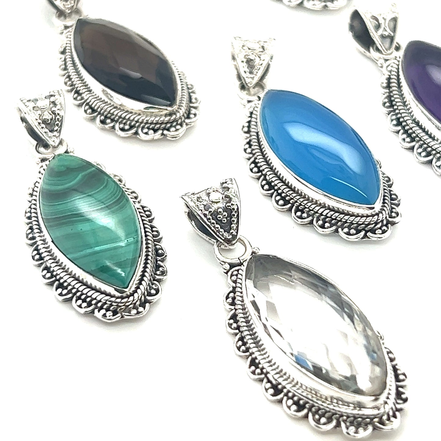 A collection of Super Silver Marquise Shaped Gemstone Pendants on a clean white background.