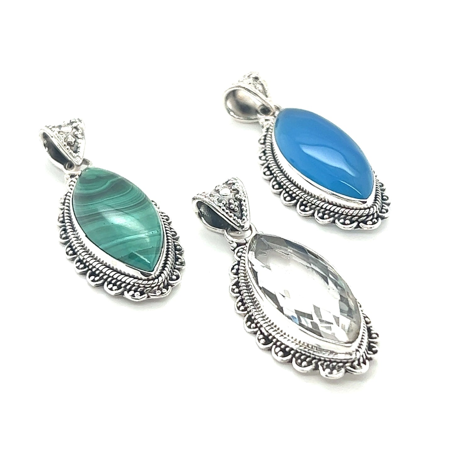 
                  
                    Three Marquise Shaped Gemstone Pendants adorned with beautiful blue and green stones, adding a pop of color to any outfit. (Brand name: Super Silver)
                  
                