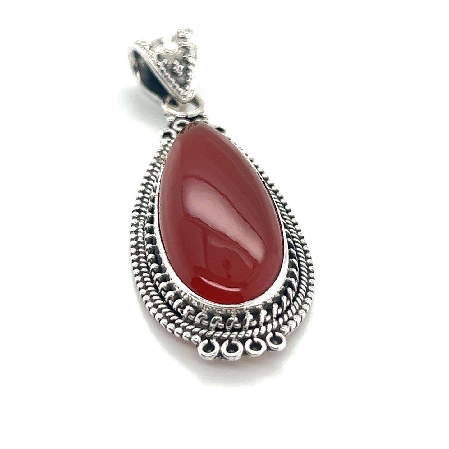 
                  
                    A Super Silver Striking Teardrop Gemstone Pendant with Beaded Detailing featuring a red carnelian stone.
                  
                