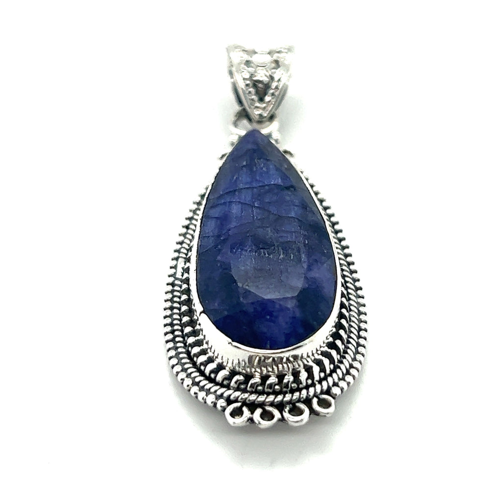 
                  
                    An elegant Super Silver Bali style sterling silver pendant with a beautiful teardrop-shaped blue sapphire stone, named the Striking Teardrop Gemstone Pendant with Beaded Detailing.
                  
                