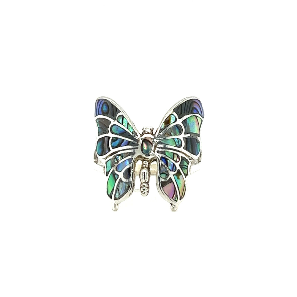 
                  
                    An intricate statement butterfly inlay ring on a white background.
                  
                