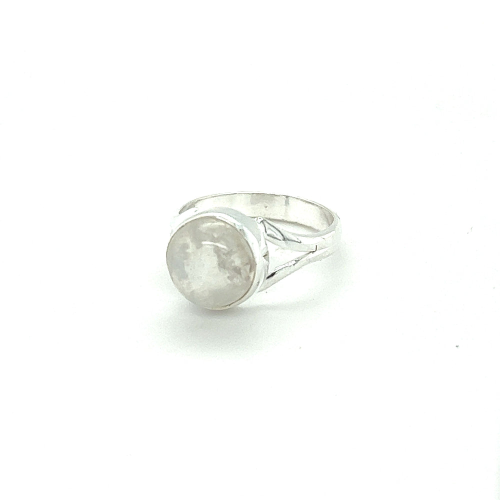 
                  
                    A Simple Vibrant Circular Stone Ring with a vibrant white stone in the middle from Super Silver.
                  
                