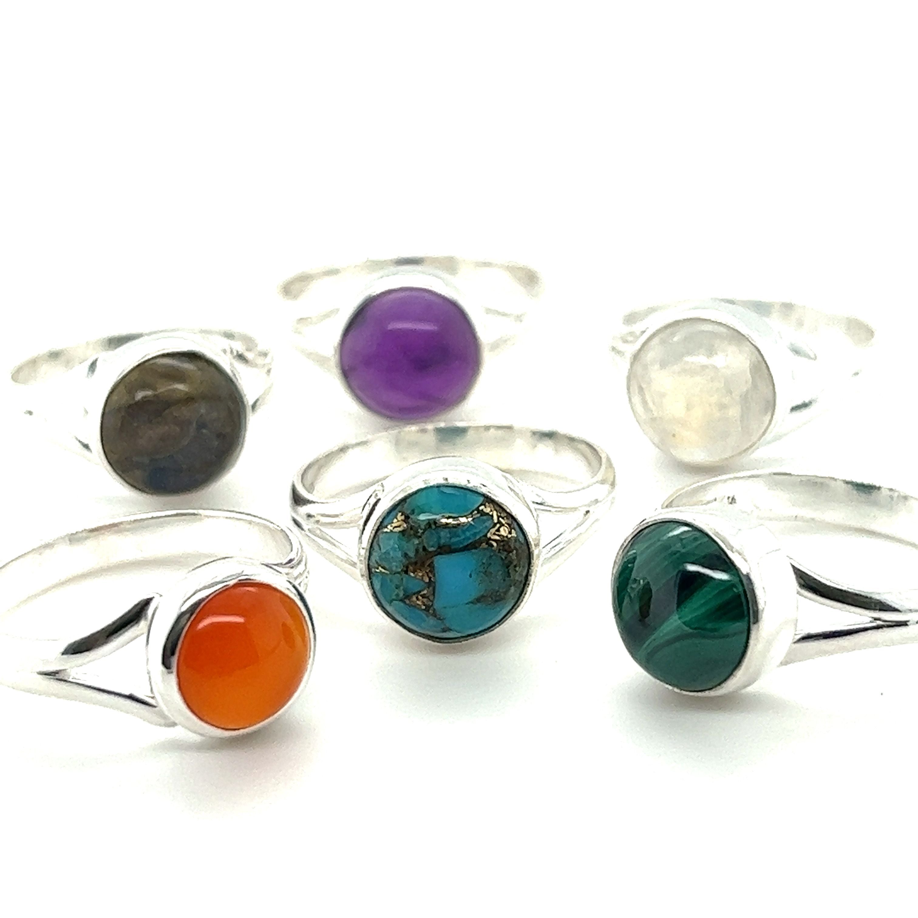 A set of Super Silver Simple Vibrant Circular Stone Rings.