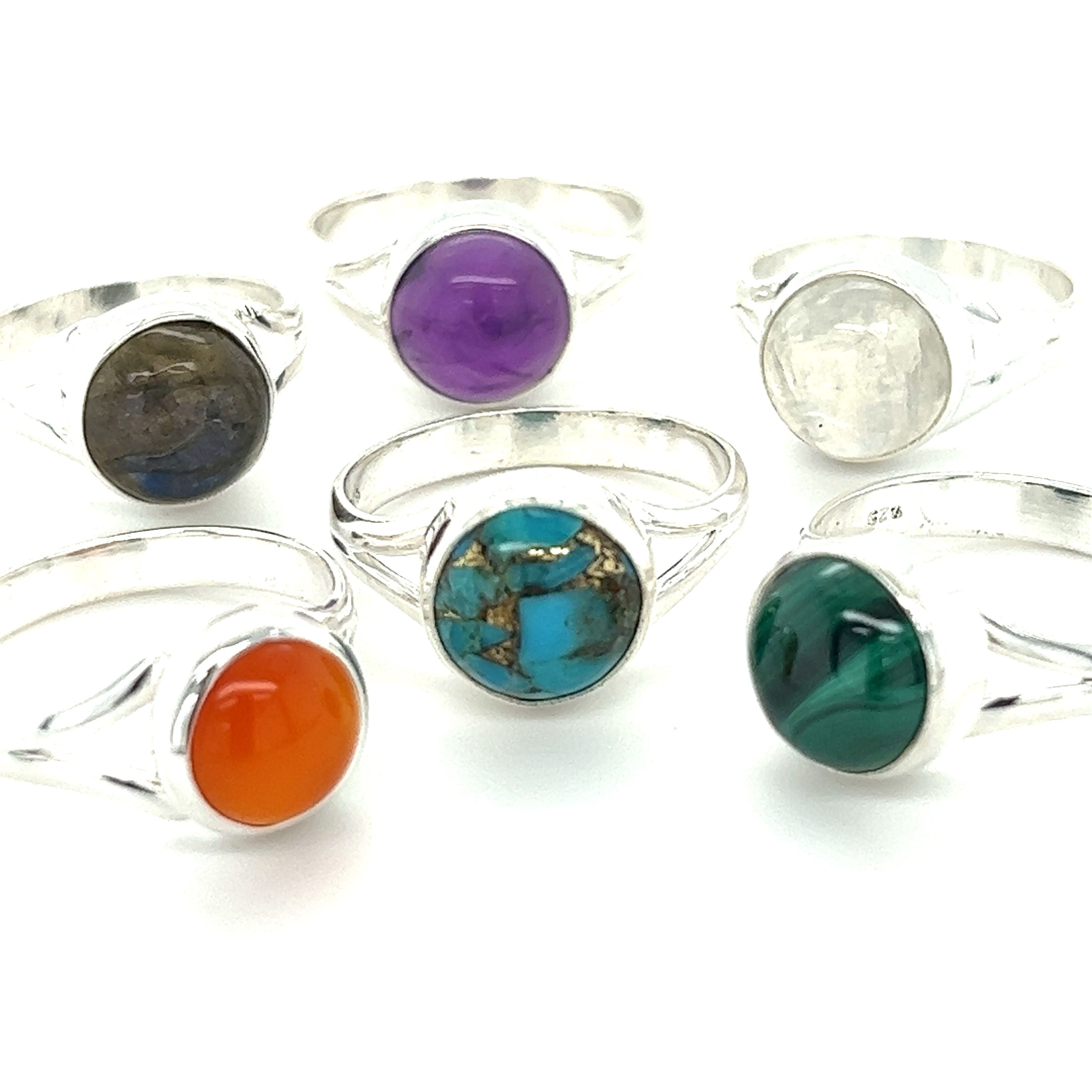 A set of Super Silver Simple Vibrant Circular Stone Rings.