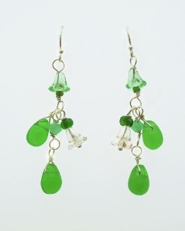 A pair of Playful Green Dangle Earrings, handcrafted with sterling silver by Super Silver.