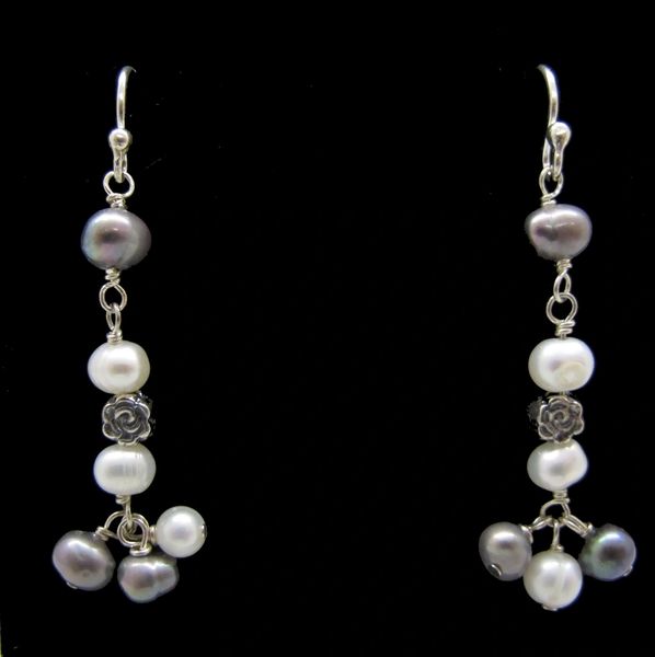 A Super Silver beaded pair of dangle earrings with white and grey pearls.