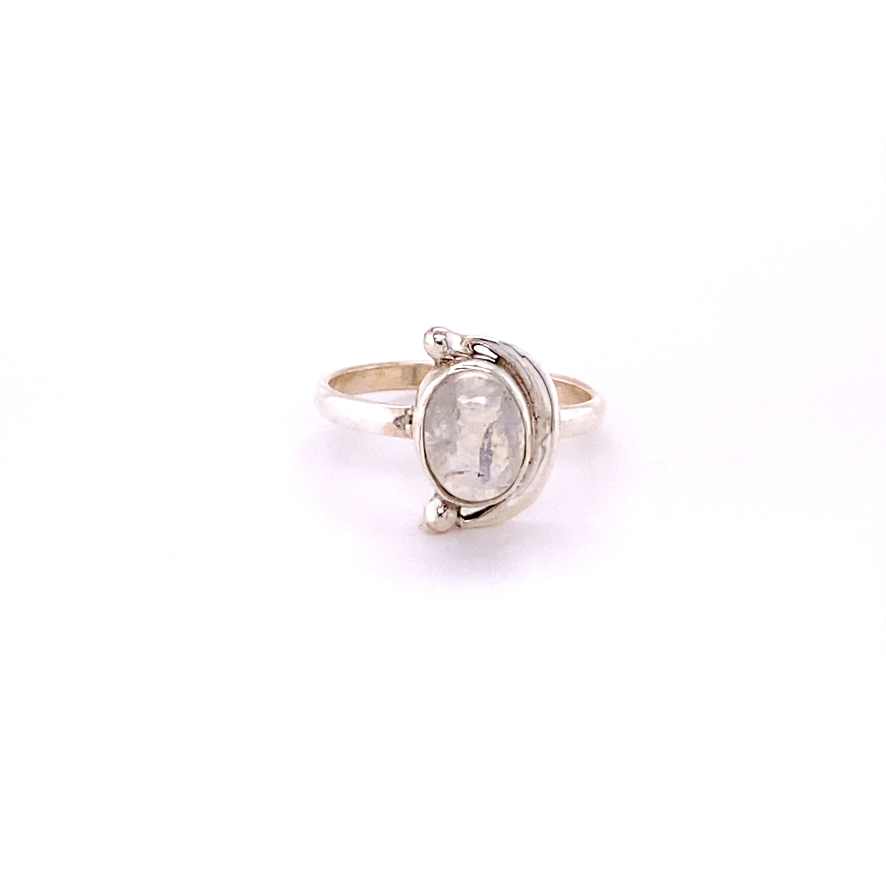 An Oval Crescent Moon Ring with Natural Gemstones with a moonstone cabochon.