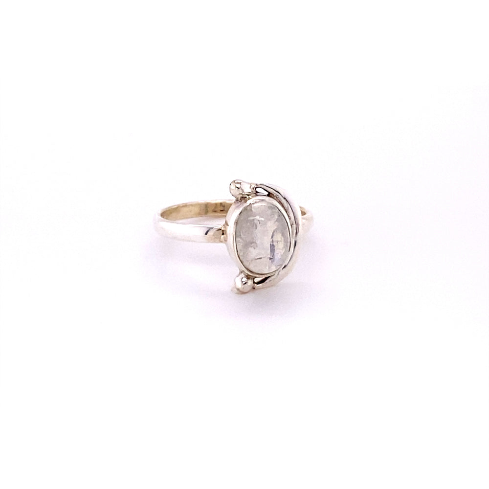 
                  
                    A Oval Crescent Moon Ring with Natural Gemstones with a white stone.
                  
                