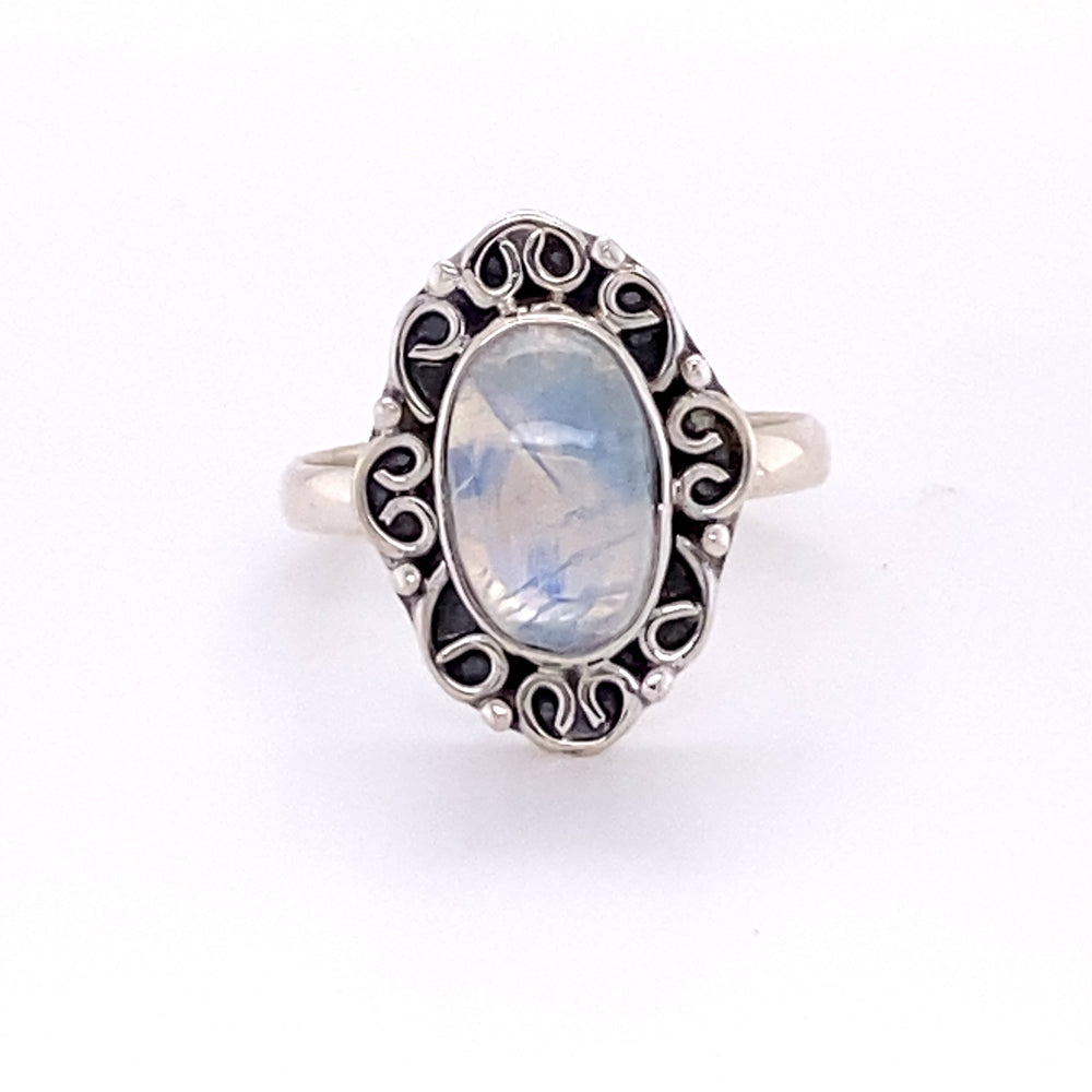 
                  
                    Oval Gemstone Ring with Swirl Filigree Border in sterling silver perfect for the hippie vibe.
                  
                